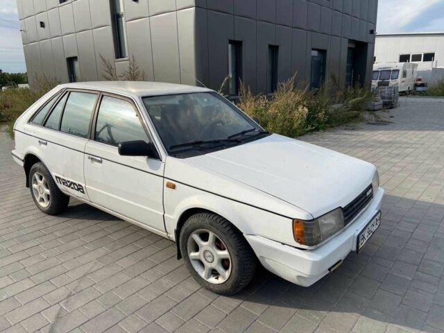 Білий Мазда 323, об'ємом двигуна 1.5 л та пробігом 230 тис. км за 849 $, фото 1 на Automoto.ua
