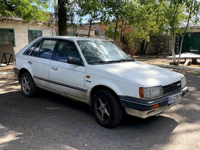 Белый Мазда 323, объемом двигателя 1.3 л и пробегом 0 тыс. км за 450 $, фото 1 на Automoto.ua
