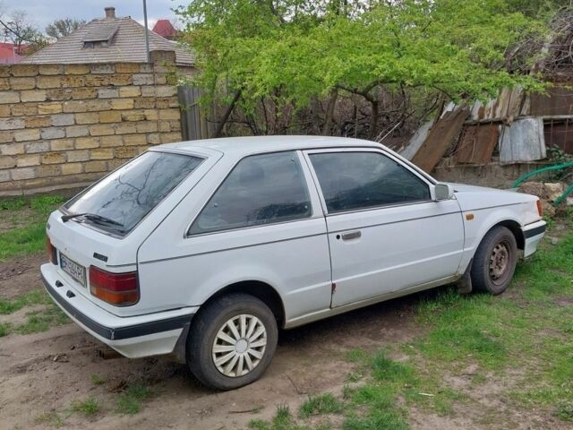 Білий Мазда 323, об'ємом двигуна 1.49 л та пробігом 350 тис. км за 499 $, фото 1 на Automoto.ua