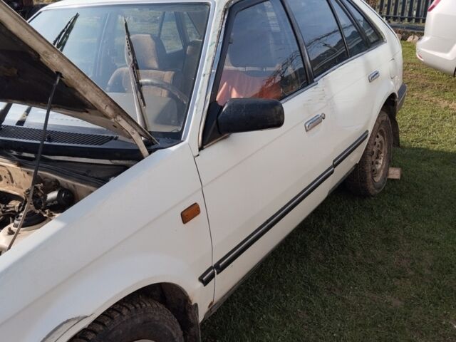 Білий Мазда 323, об'ємом двигуна 1.5 л та пробігом 270 тис. км за 700 $, фото 1 на Automoto.ua