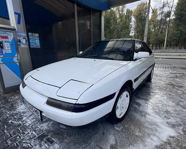 Білий Мазда 323, об'ємом двигуна 1.6 л та пробігом 199 тис. км за 1999 $, фото 1 на Automoto.ua