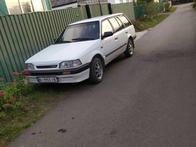 Білий Мазда 323, об'ємом двигуна 1.5 л та пробігом 20 тис. км за 1187 $, фото 1 на Automoto.ua