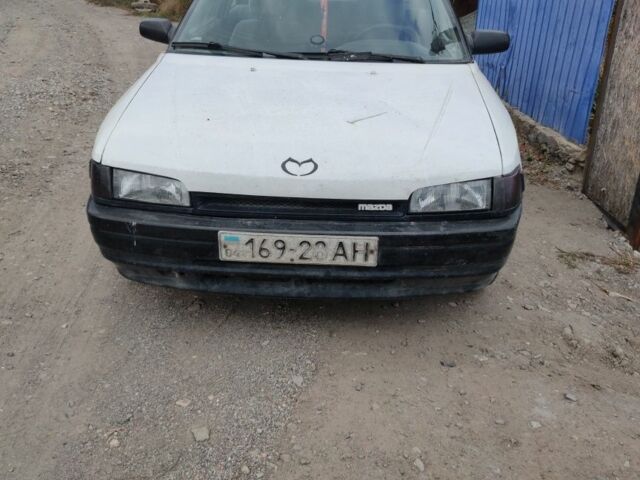 Белый Мазда 323, объемом двигателя 0 л и пробегом 480 тыс. км за 500 $, фото 1 на Automoto.ua