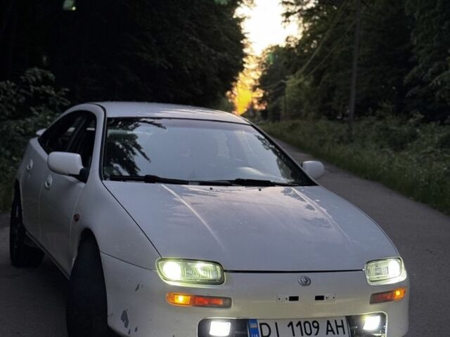 Білий Мазда 323, об'ємом двигуна 2 л та пробігом 430 тис. км за 2500 $, фото 1 на Automoto.ua