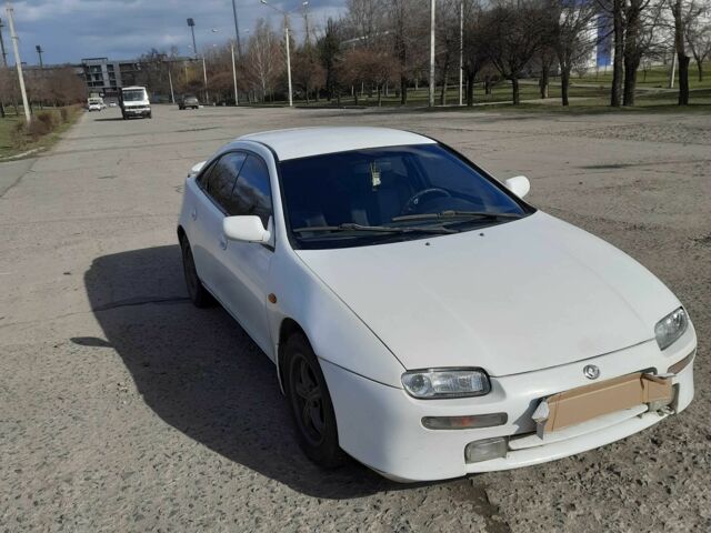 Білий Мазда 323, об'ємом двигуна 2 л та пробігом 300 тис. км за 2300 $, фото 1 на Automoto.ua