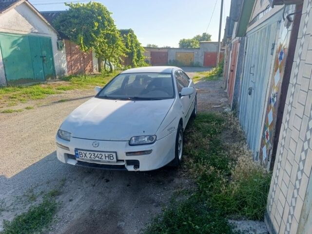 Белый Мазда 323, объемом двигателя 1.5 л и пробегом 380 тыс. км за 1550 $, фото 1 на Automoto.ua