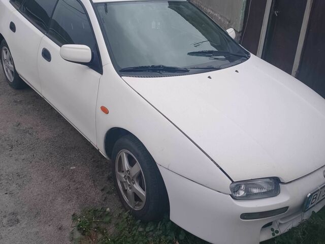 Білий Мазда 323, об'ємом двигуна 1.8 л та пробігом 271 тис. км за 1942 $, фото 1 на Automoto.ua