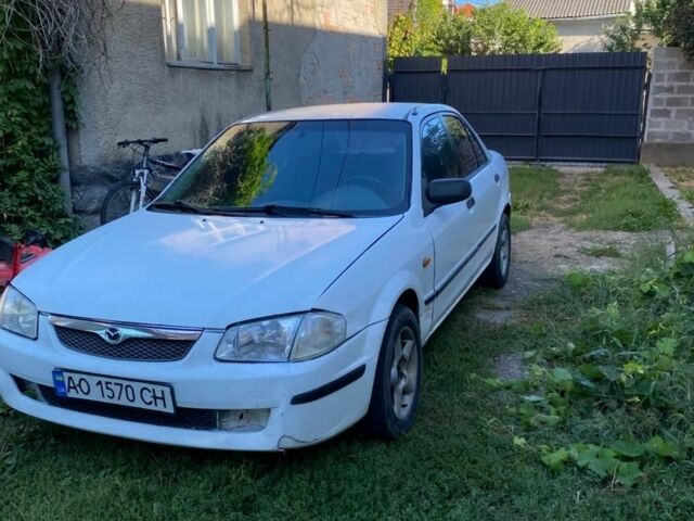Білий Мазда 323, об'ємом двигуна 0 л та пробігом 100 тис. км за 1304 $, фото 1 на Automoto.ua