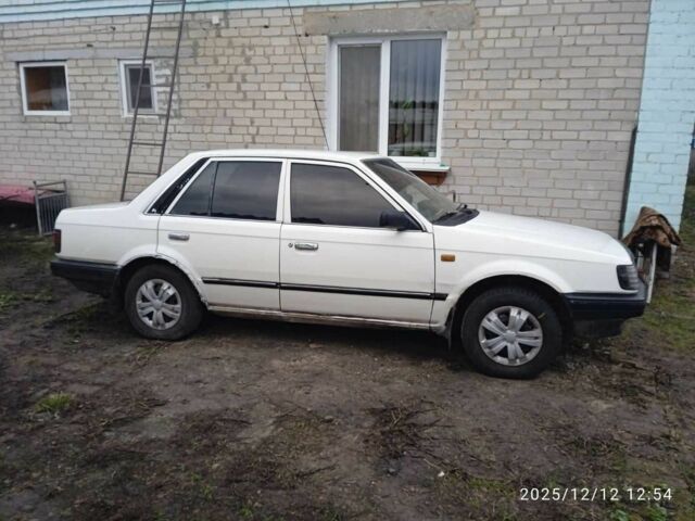Білий Мазда 323, об'ємом двигуна 1.3 л та пробігом 324 тис. км за 355 $, фото 1 на Automoto.ua