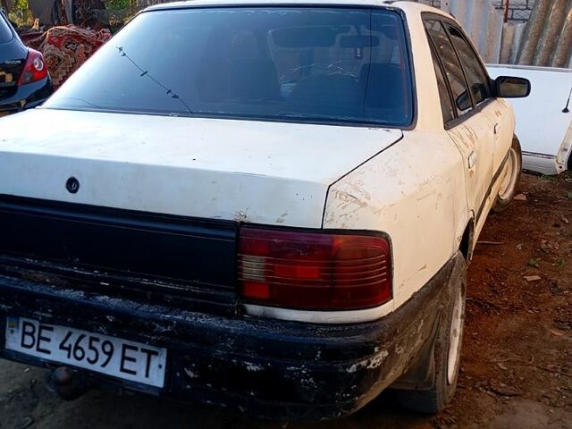 Білий Мазда 323, об'ємом двигуна 1.5 л та пробігом 0 тис. км за 700 $, фото 1 на Automoto.ua
