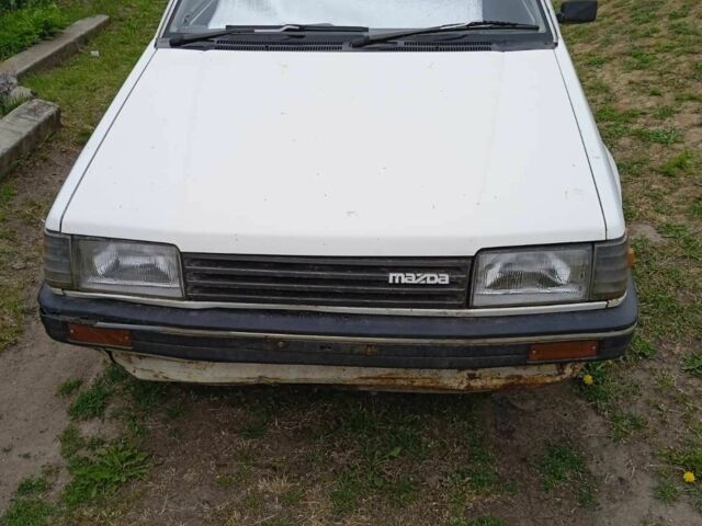 Білий Мазда 323, об'ємом двигуна 6 л та пробігом 252 тис. км за 503 $, фото 1 на Automoto.ua