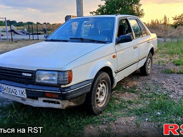 Білий Мазда 323, об'ємом двигуна 1.6 л та пробігом 350 тис. км за 650 $, фото 1 на Automoto.ua