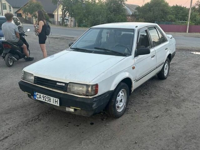 Белый Мазда 323, объемом двигателя 1.3 л и пробегом 1 тыс. км за 350 $, фото 1 на Automoto.ua