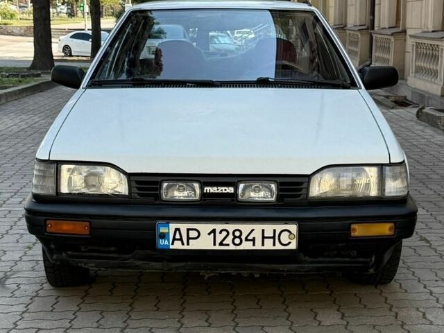 Белый Мазда 323, объемом двигателя 1.3 л и пробегом 287 тыс. км за 850 $, фото 1 на Automoto.ua