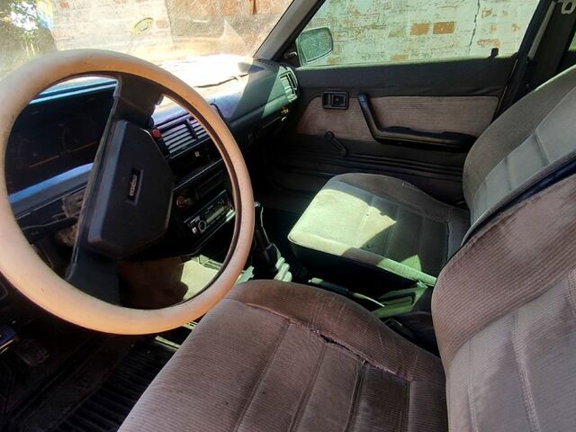 Білий Мазда 323, об'ємом двигуна 1.3 л та пробігом 380 тис. км за 720 $, фото 1 на Automoto.ua