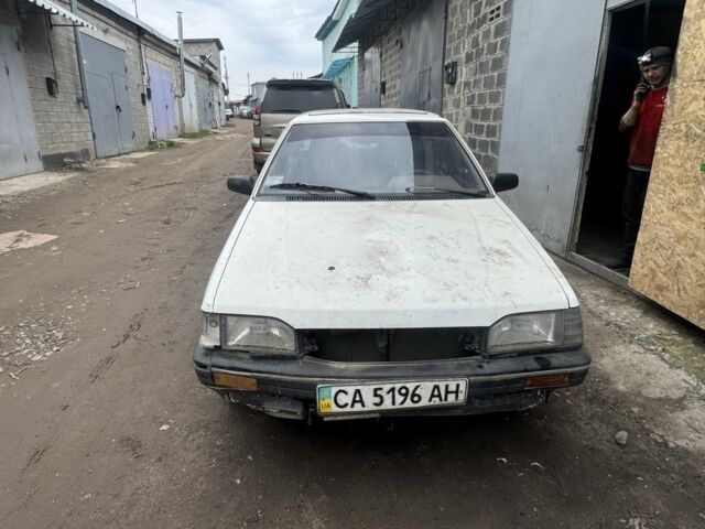 Білий Мазда 323, об'ємом двигуна 1.6 л та пробігом 251 тис. км за 350 $, фото 1 на Automoto.ua