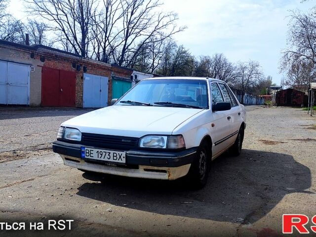 Белый Мазда 323, объемом двигателя 1.3 л и пробегом 888 тыс. км за 800 $, фото 1 на Automoto.ua