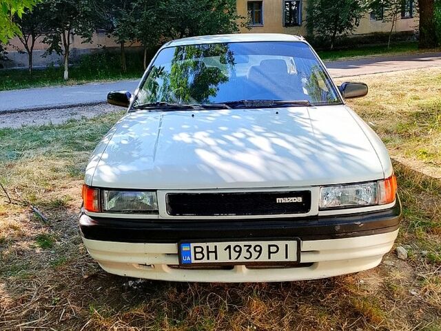 Белый Мазда 323, объемом двигателя 1.8 л и пробегом 0 тыс. км за 1800 $, фото 1 на Automoto.ua