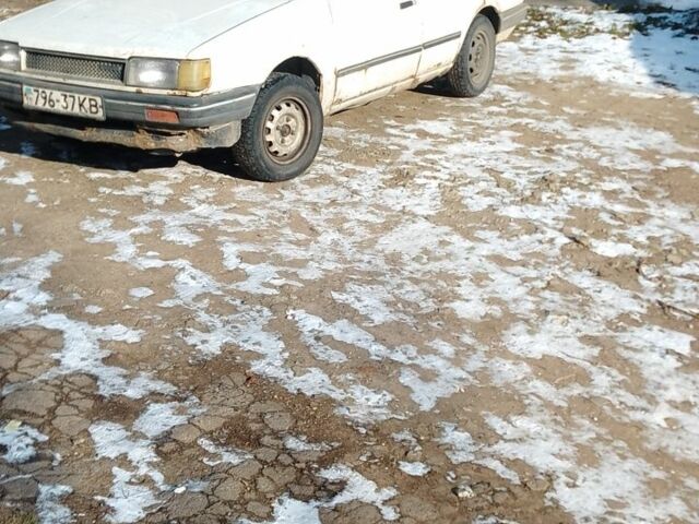 Белый Мазда 323, объемом двигателя 0 л и пробегом 470 тыс. км за 903 $, фото 1 на Automoto.ua