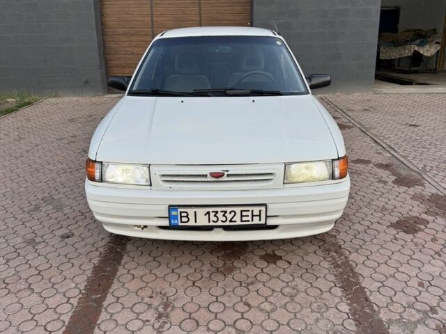Белый Мазда 323, объемом двигателя 1.6 л и пробегом 350 тыс. км за 1850 $, фото 1 на Automoto.ua