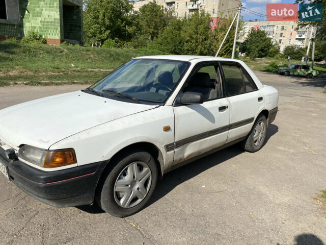 Білий Мазда 323, об'ємом двигуна 1.7 л та пробігом 196 тис. км за 1400 $, фото 1 на Automoto.ua