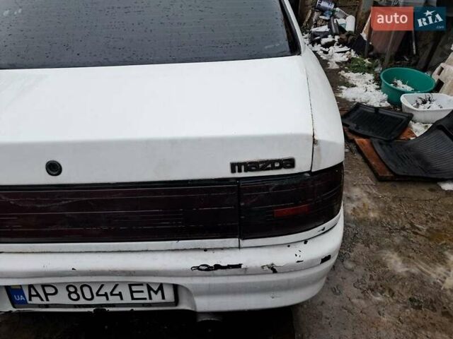 Белый Мазда 323, объемом двигателя 1.7 л и пробегом 600 тыс. км за 800 $, фото 1 на Automoto.ua