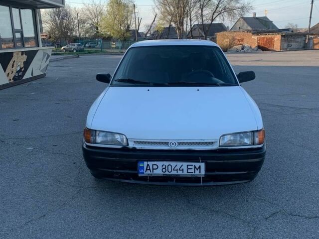 Білий Мазда 323, об'ємом двигуна 1.7 л та пробігом 300 тис. км за 1153 $, фото 1 на Automoto.ua