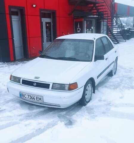 Білий Мазда 323, об'ємом двигуна 1.84 л та пробігом 250 тис. км за 1000 $, фото 1 на Automoto.ua