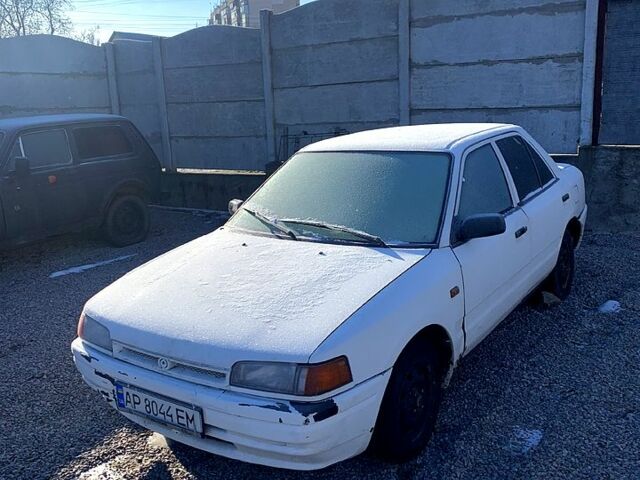 Белый Мазда 323, объемом двигателя 1.7 л и пробегом 0 тыс. км за 1150 $, фото 1 на Automoto.ua