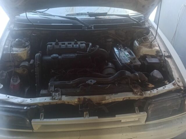 Білий Мазда 323, об'ємом двигуна 1.7 л та пробігом 230 тис. км за 1038 $, фото 1 на Automoto.ua