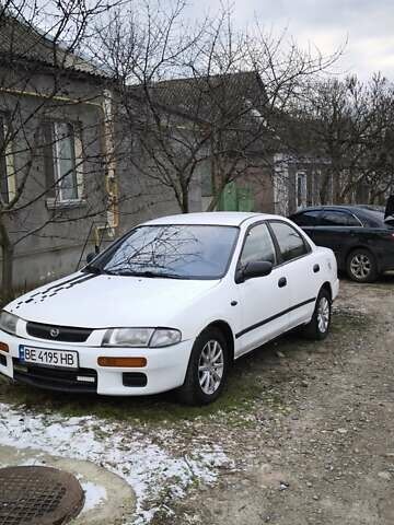 Білий Мазда 323, об'ємом двигуна 1.5 л та пробігом 398 тис. км за 1500 $, фото 1 на Automoto.ua