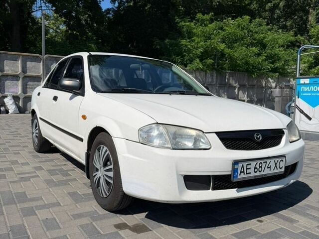 Білий Мазда 323, об'ємом двигуна 1.5 л та пробігом 270 тис. км за 1500 $, фото 1 на Automoto.ua