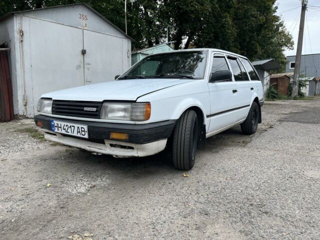Белый Мазда 323, объемом двигателя 1.6 л и пробегом 293 тыс. км за 1808 $, фото 1 на Automoto.ua