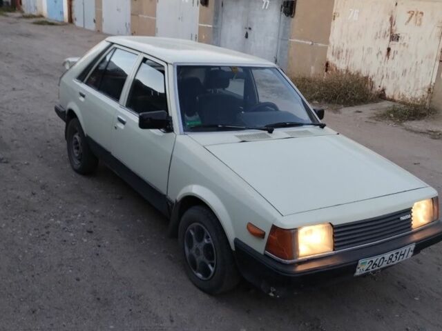Бежевий Мазда 323, об'ємом двигуна 1.3 л та пробігом 98 тис. км за 603 $, фото 1 на Automoto.ua
