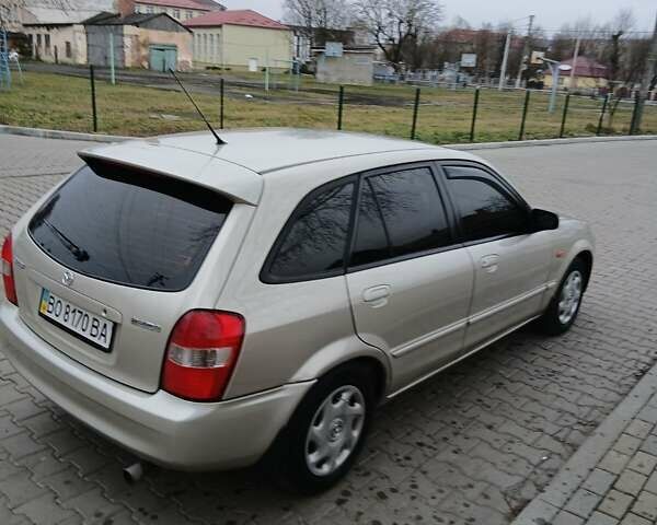 Бежевый Мазда 323, объемом двигателя 2 л и пробегом 210 тыс. км за 2550 $, фото 1 на Automoto.ua