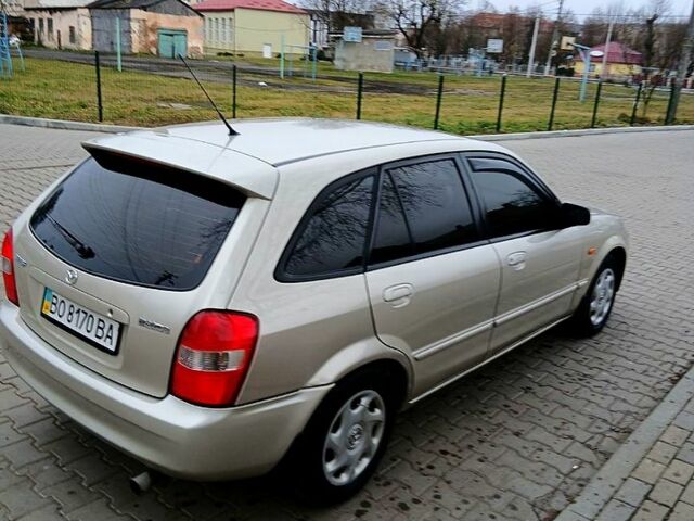 Бежевый Мазда 323, объемом двигателя 2 л и пробегом 210 тыс. км за 2300 $, фото 1 на Automoto.ua
