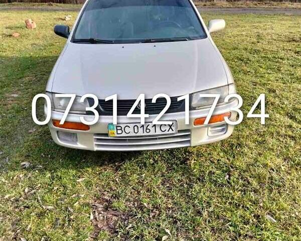 Бежевый Мазда 323, объемом двигателя 1.49 л и пробегом 250 тыс. км за 1350 $, фото 1 на Automoto.ua