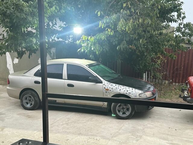 Бежевий Мазда 323, об'ємом двигуна 1.3 л та пробігом 1 тис. км за 803 $, фото 1 на Automoto.ua