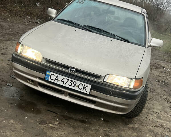 Бежевый Мазда 323, объемом двигателя 1.6 л и пробегом 250 тыс. км за 1500 $, фото 1 на Automoto.ua