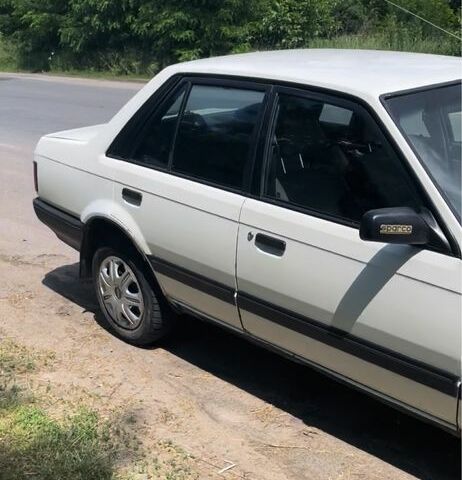 Бежевий Мазда 323, об'ємом двигуна 0 л та пробігом 250 тис. км за 847 $, фото 1 на Automoto.ua