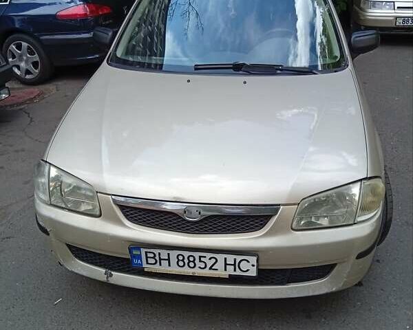 Бежевый Мазда 323, объемом двигателя 1.6 л и пробегом 306 тыс. км за 3000 $, фото 1 на Automoto.ua
