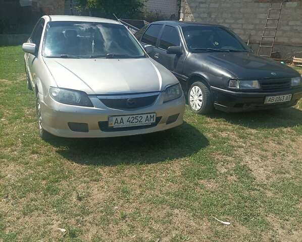 Бежевий Мазда 323, об'ємом двигуна 1.5 л та пробігом 262 тис. км за 2100 $, фото 1 на Automoto.ua