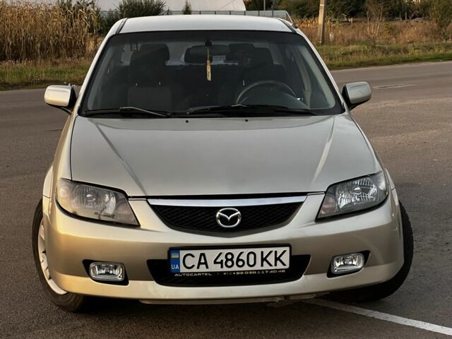 Бежевый Мазда 323, объемом двигателя 0 л и пробегом 225 тыс. км за 2007 $, фото 1 на Automoto.ua