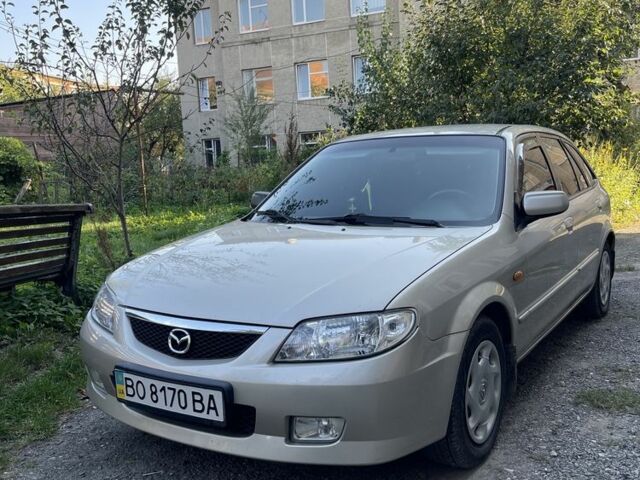 Бежевий Мазда 323, об'ємом двигуна 2 л та пробігом 218 тис. км за 2999 $, фото 1 на Automoto.ua