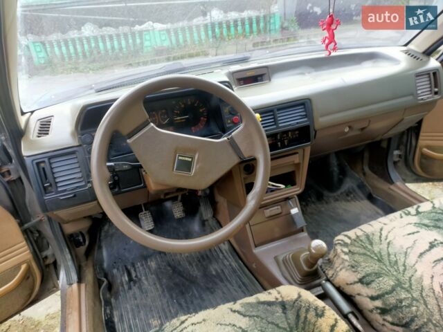 Черный Мазда 323, объемом двигателя 0 л и пробегом 249 тыс. км за 750 $, фото 1 на Automoto.ua