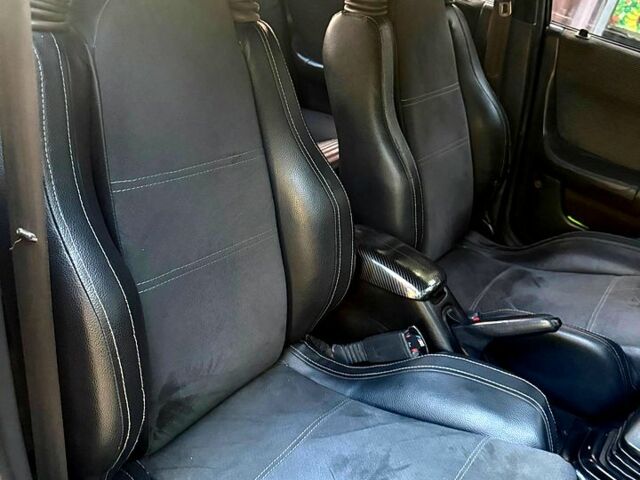 Чорний Мазда 323, об'ємом двигуна 1.8 л та пробігом 450 тис. км за 1430 $, фото 1 на Automoto.ua