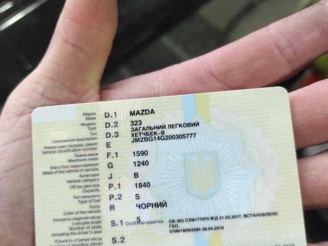Чорний Мазда 323, об'ємом двигуна 1.8 л та пробігом 125 тис. км за 550 $, фото 1 на Automoto.ua