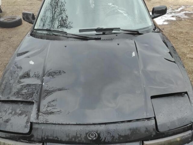 Чорний Мазда 323, об'ємом двигуна 1.8 л та пробігом 125 тис. км за 900 $, фото 1 на Automoto.ua