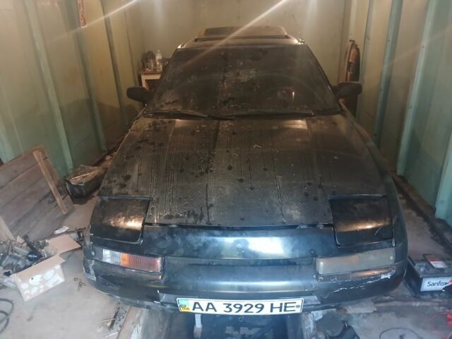 Чорний Мазда 323, об'ємом двигуна 1.8 л та пробігом 316 тис. км за 502 $, фото 1 на Automoto.ua