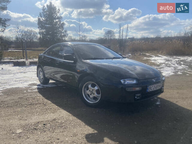 Черный Мазда 323, объемом двигателя 1.49 л и пробегом 380 тыс. км за 2300 $, фото 1 на Automoto.ua